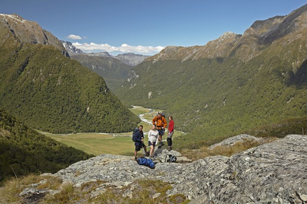 Walkers taking in the view in the Routeburn Valley